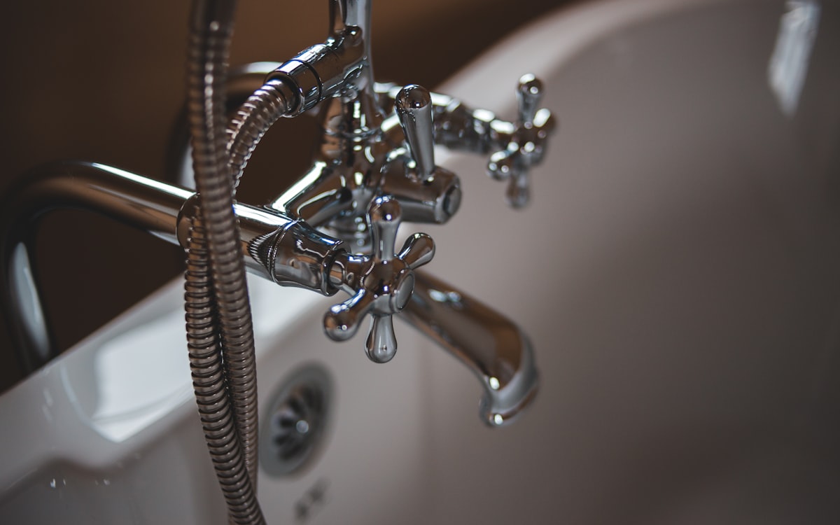Polished chrome faucet installed by a licensed plumber